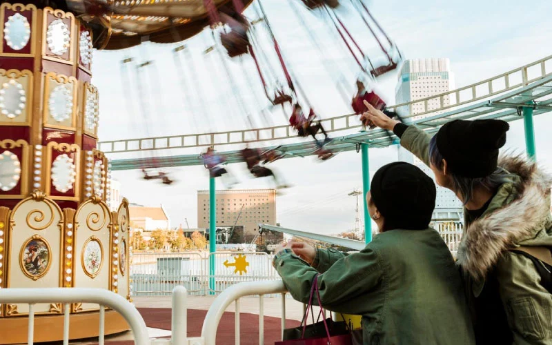 A cozy family-friendly hotel near Alton Towers Resort with theme park in the background.