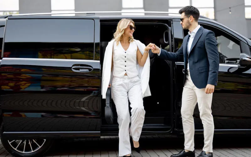 Modern coach with a professional driver in London, ready for group hire.