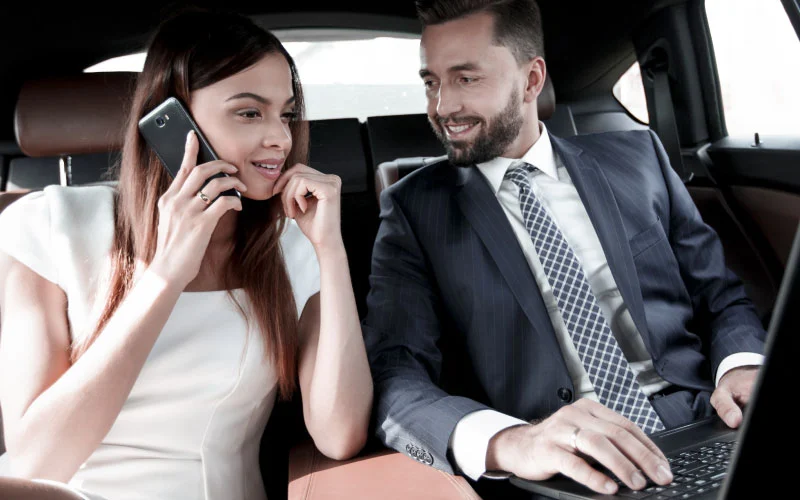 Luxury private coach hire with corporate clients boarding in London.